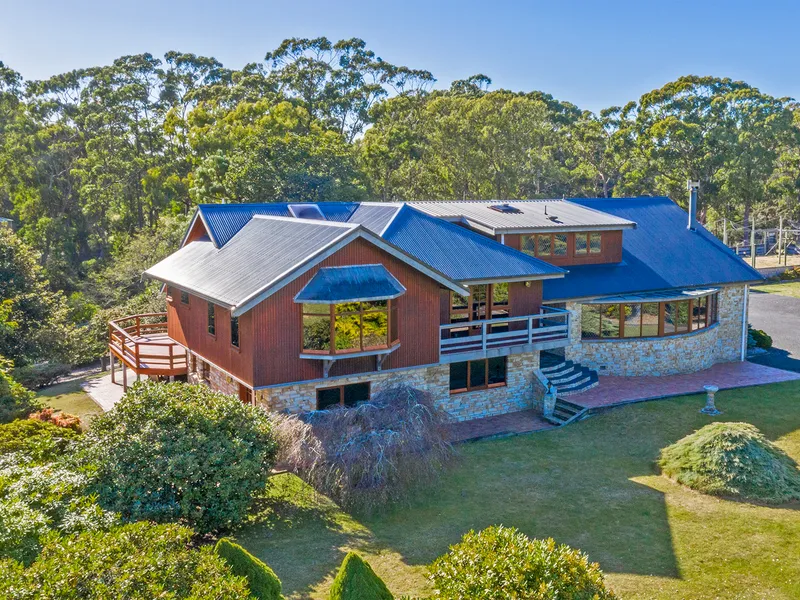 Nestled on the Bank of the Duck River you will find this Exquisite Executive Residence on 10.3 acres 