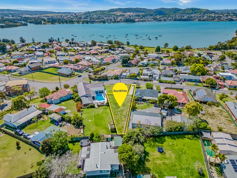 Elevated land with lake views, utilities connected and 723sqms registered land