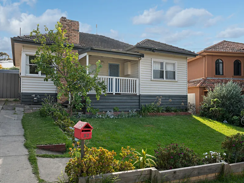 Elevated Potential Opposite the Park!