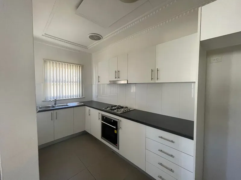 Located at the back of a property is this 1 bedroom flat .