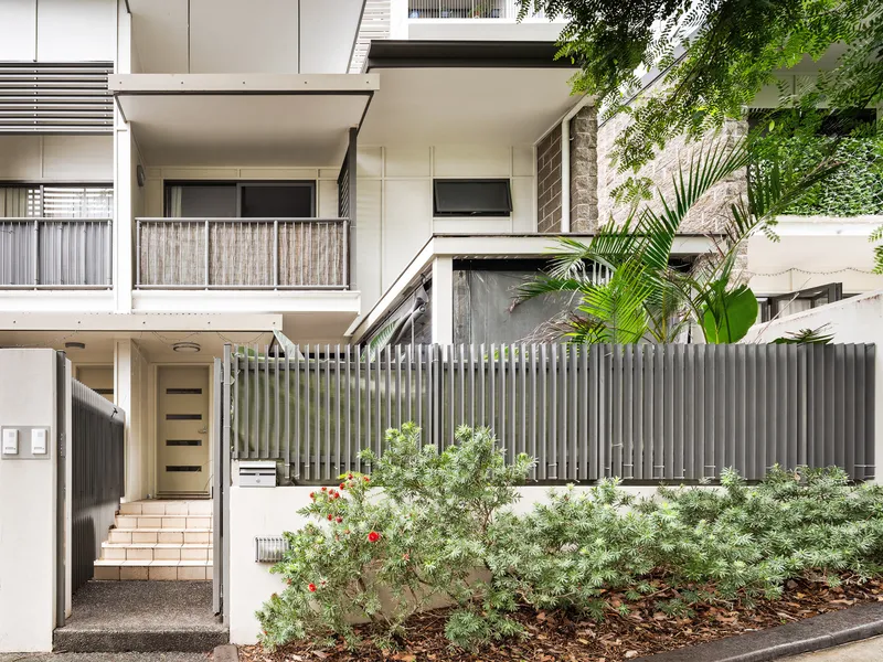 Modern, Executive Townhome with Two Carparks!