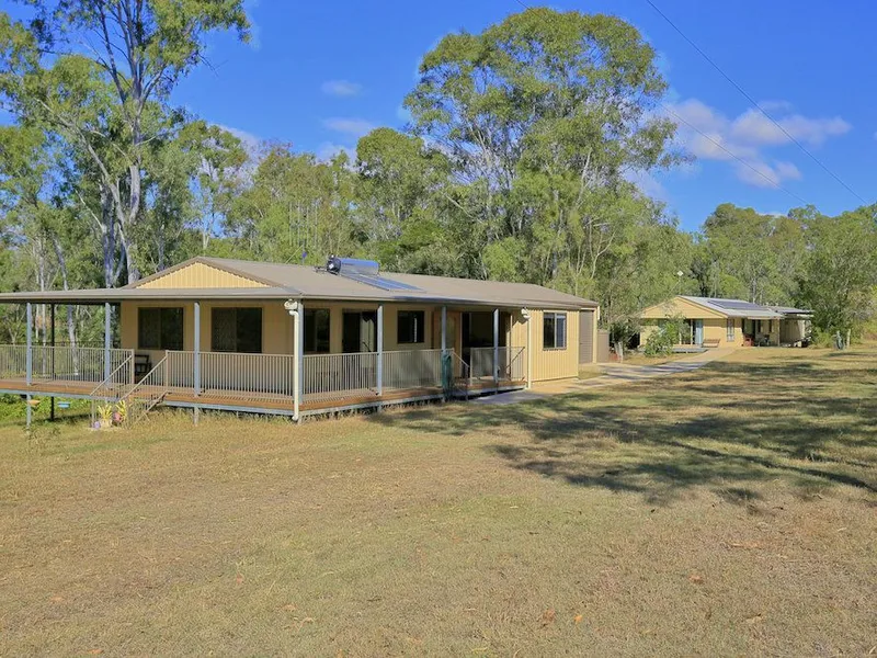 A RETREAT FOR TWO FAMILIES ON 5 ACRES! A MUST SEE PROPERTY!