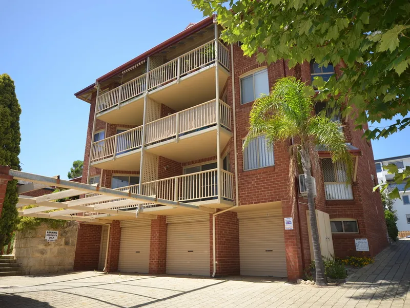 Walk everywhere location with city views and lock up garage/store