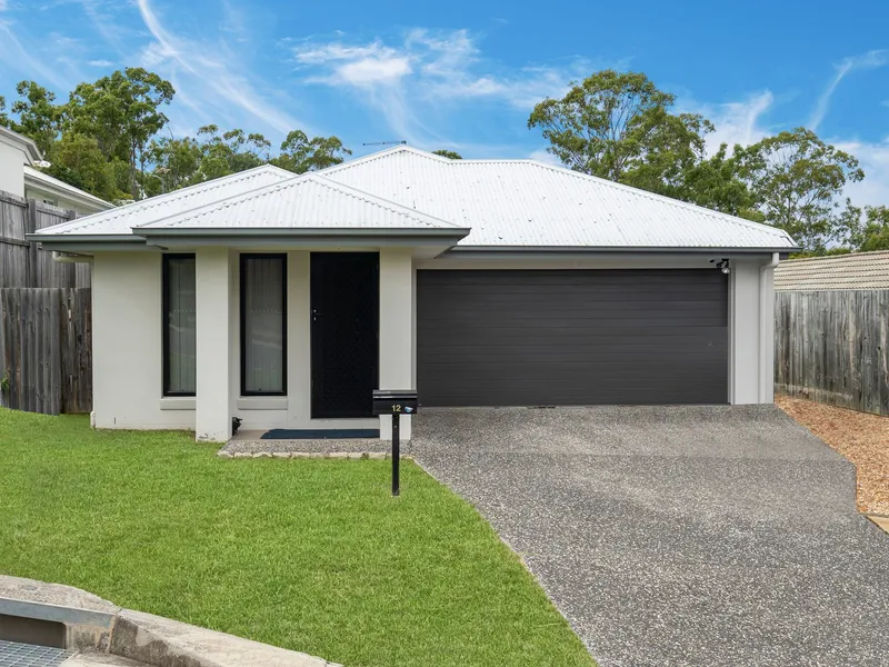 Discover Your Dream Home at 12 Poppy Crescent, Springfield Lakes.