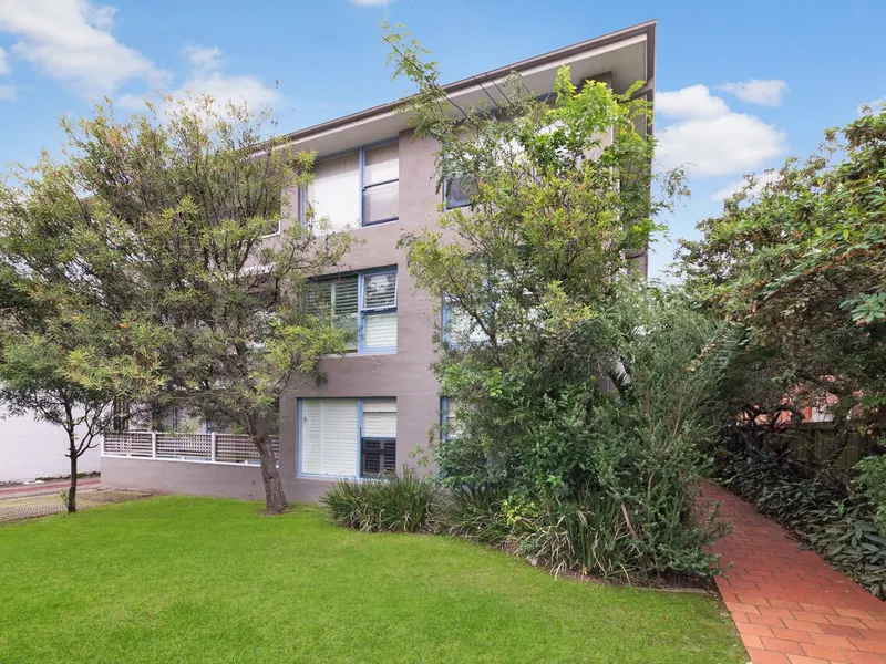 Walk to village shops and Rail.