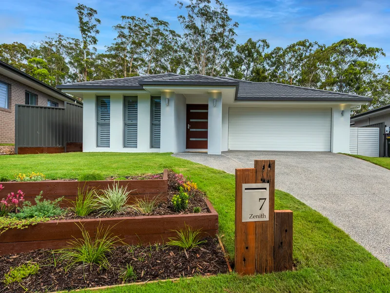 WELCOME HOME WITH THIS LUXURY COASTAL STUNNER.