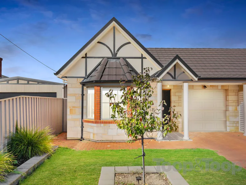 Quality Reproduction Home in Tree-lined Locale!