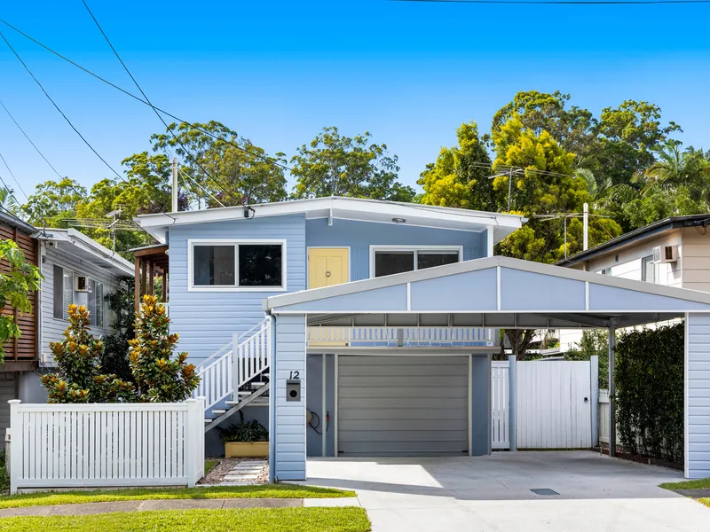 Renovated Home with Treetop Views and Dual Living Potential