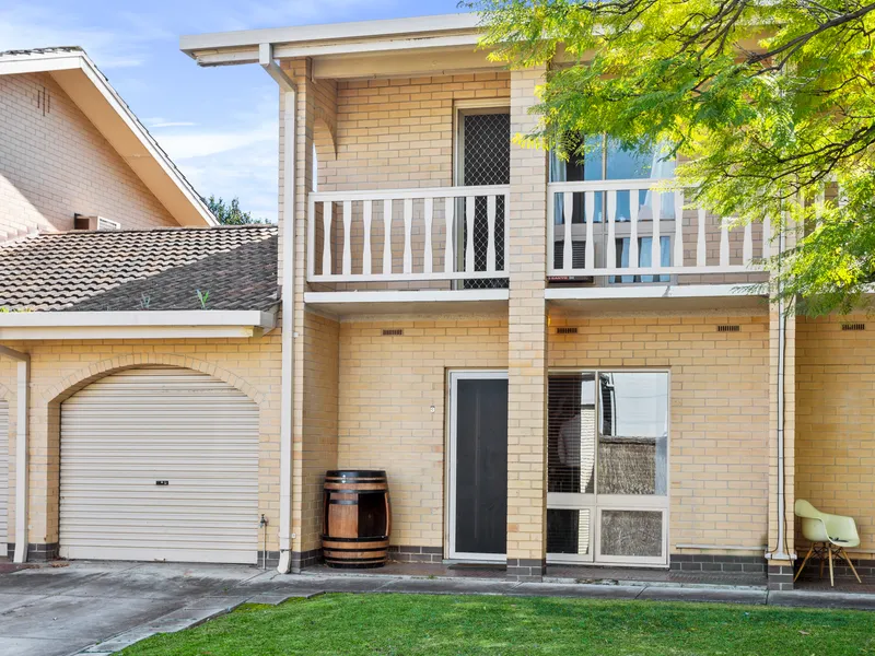 Enviably updated townhouse in impeccable City fringe position