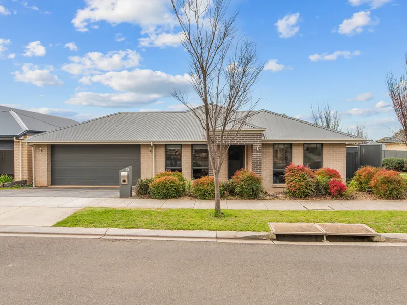 THOUGHTFULLY DESIGNED FAMILY HOME!