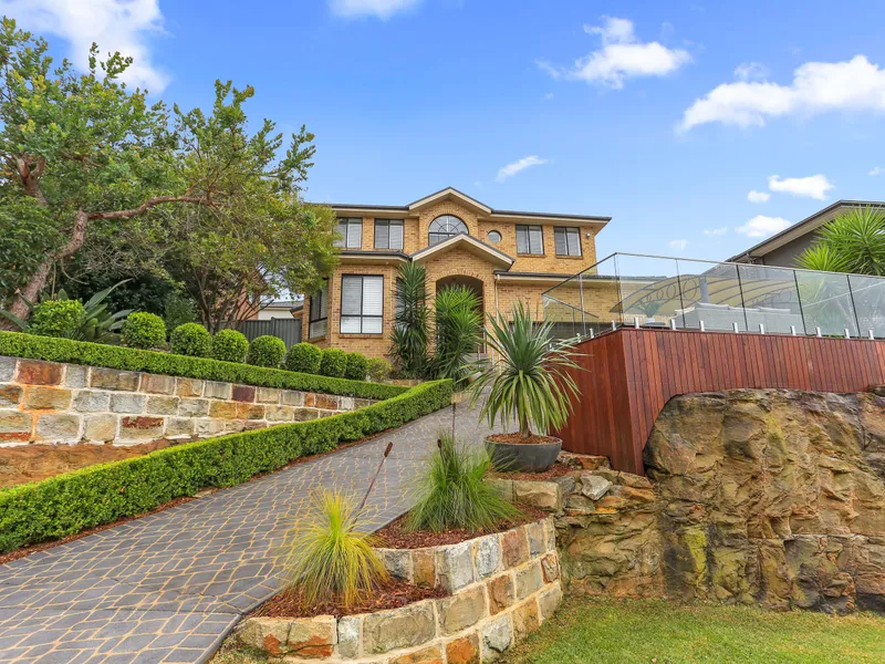 The ultimate entertainer & one of the smartest homes in the Hills District!