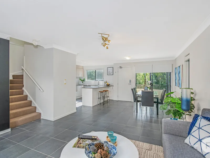 Easy-care living awaits in this light-filled townhouse