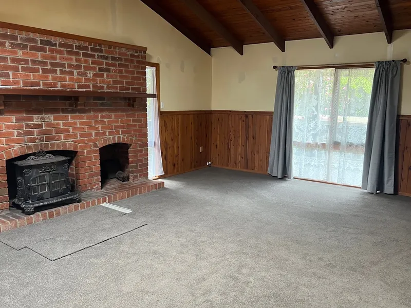 Charming log home with wrap around verandah.