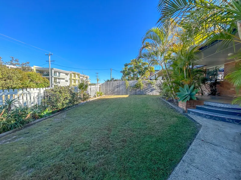 NEAT AND TIDY FAMILY HOME WITH FENCED YARD
