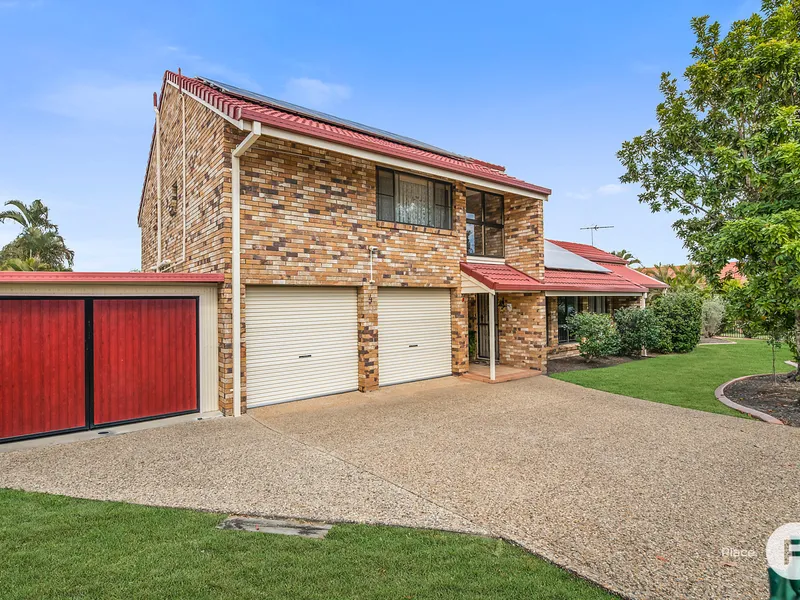 Comfortable family living on a corner lot with a pool