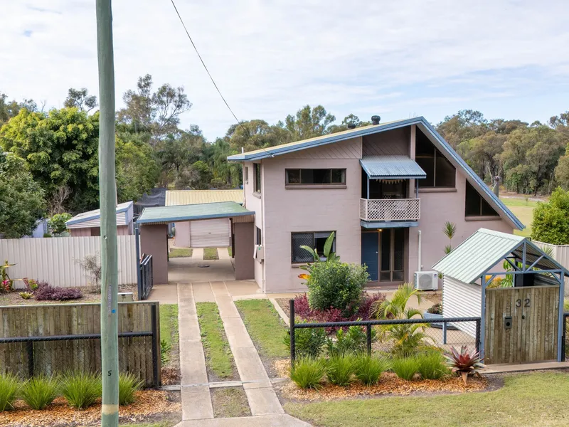 RARE FIND WITH GARAGE GALORE!