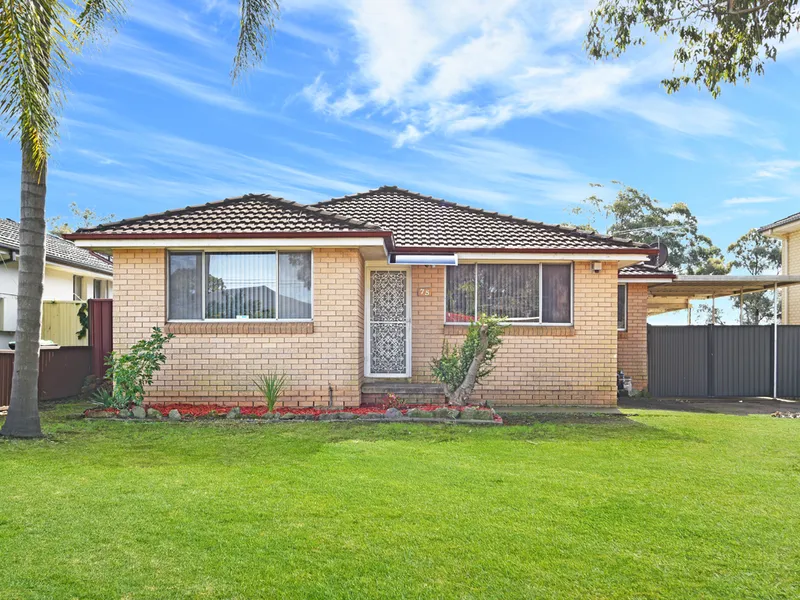 Renovated brick home on a wide street