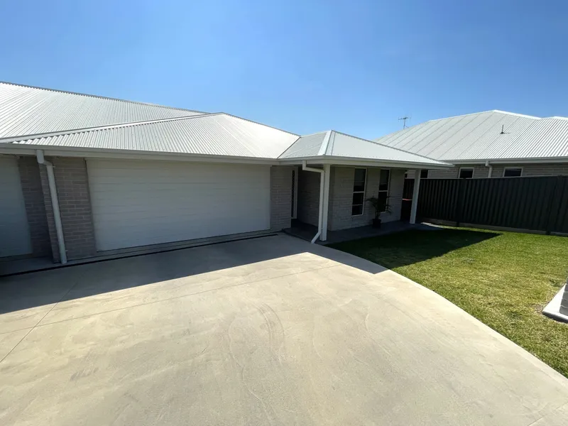 NEAR NEW TIDY THREE BEDROOM HOME