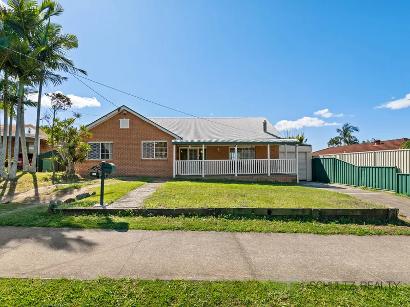 Unique Character home in Mount Warren Park with drive through garage to large back yard