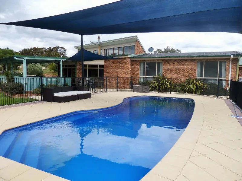 Architect Designed Executive Home with Pool and Sheds