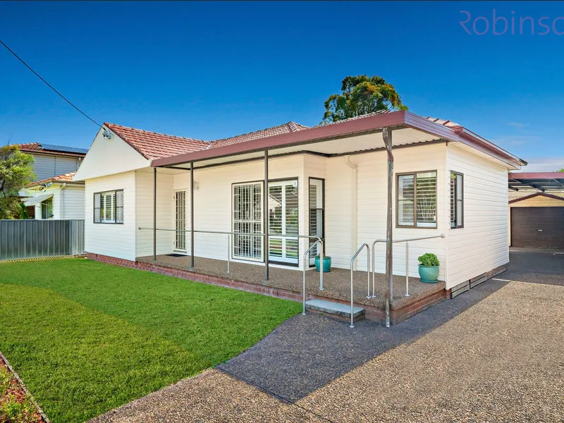 Three bedroom air conditioned home with two spacious living areas