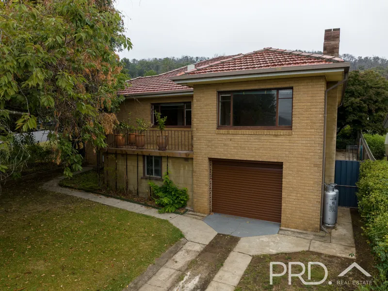 SPLIT LEVEL THREE BEDROOM HOME
