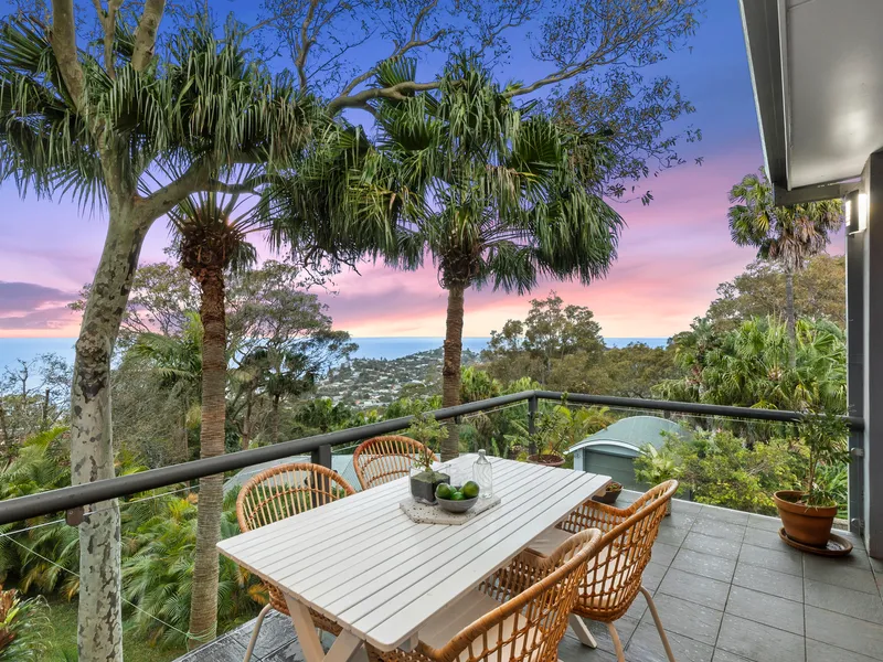 Family oasis with ocean views in lush setting