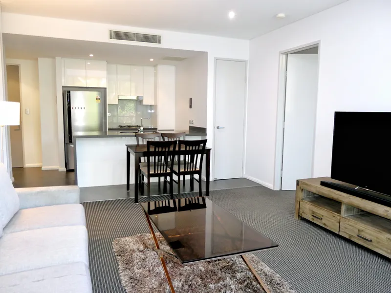 QUIET STYLISH PENTHOUSE APARTMENT - 2 BEDROOMS + STUDY, 2 BATHROOMS, 2 CARSPACES & STORAGE - RARELY OFFERED!