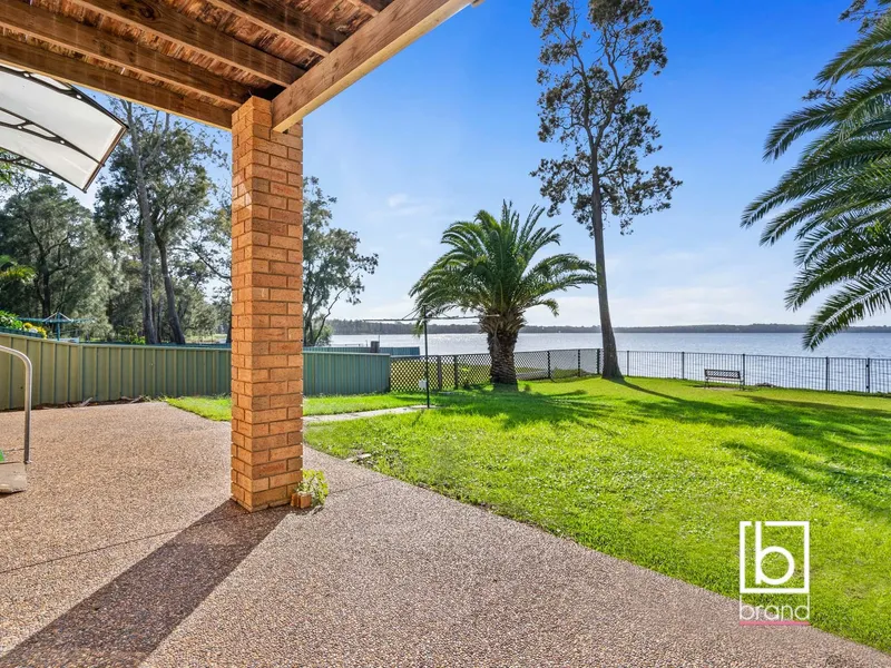 ABSOLUTE WATERFRONT WITH IN-GROUND POOL