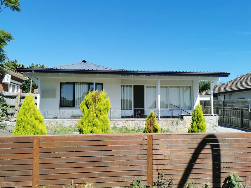 Renovated 4 bedroom solid brick home in unbeatable location