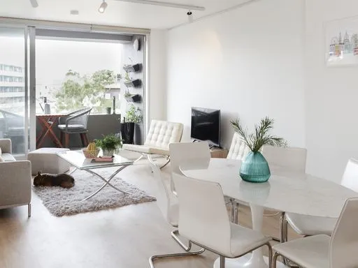 Central, spacious, split-level furnished apartment with parking
