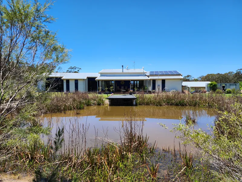 TOTAL PRIVACY WITH ARCHITECTURAL UNIQUENESS - $1,175,000