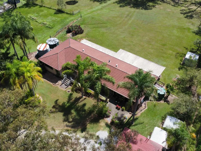 5 Acres + Spacious 5 Bedroom Home.