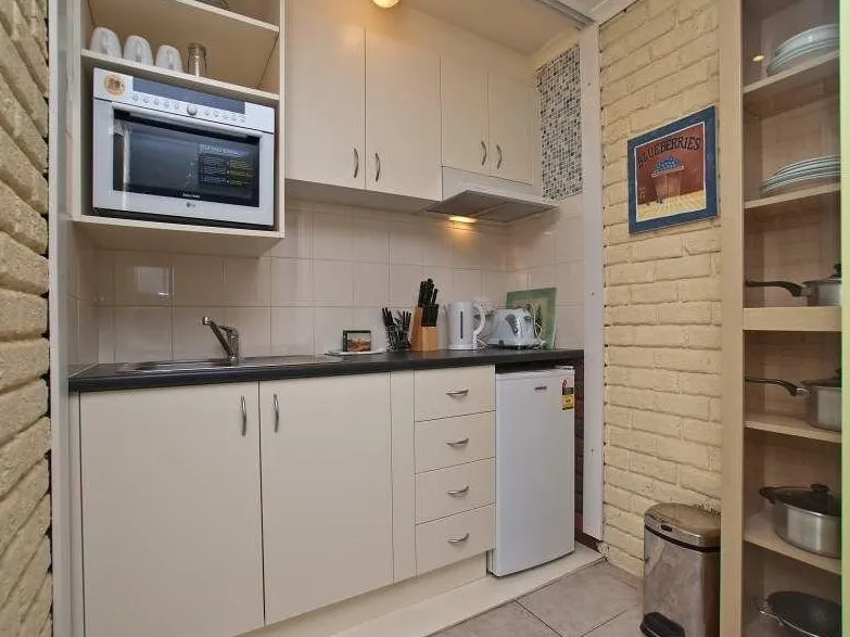 **Ground Floor - 1 Bdrm Plus Lounge Plus Kitchenette and Private Courtyard