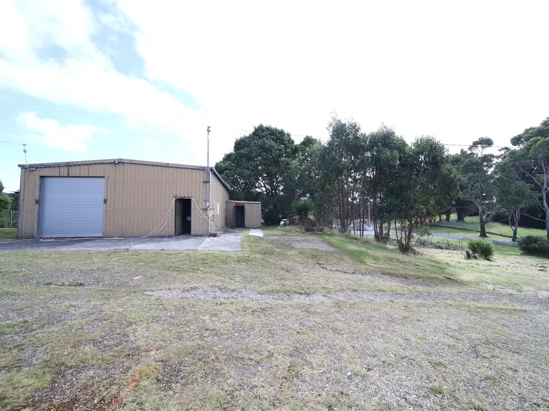 Two Residential Blocks, Garage and Caravan