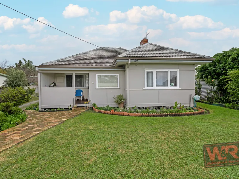 This lovely house has rear access and 2 sheds to offer