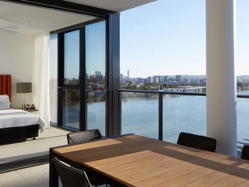 Absolute Riverfront Living – 4 Bed Apartment with River & City Views + 2 Car Spaces