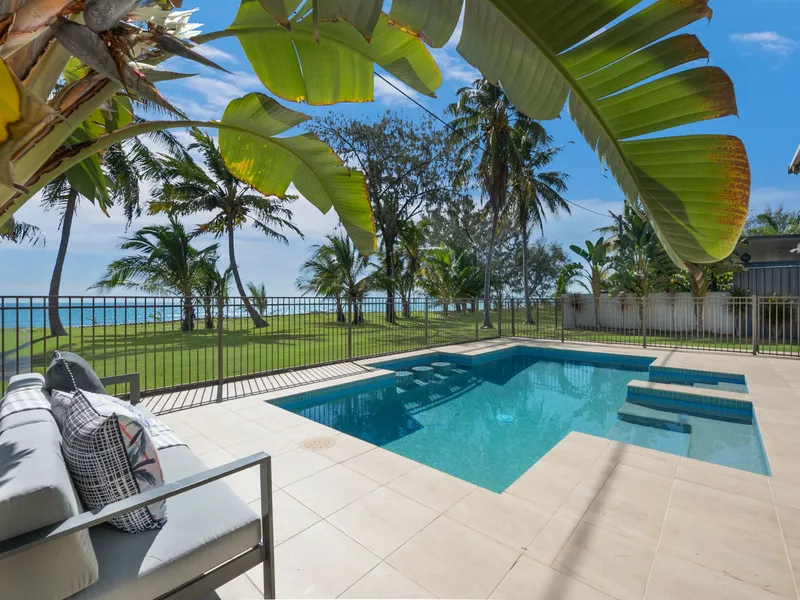 STUNNING Beachfront Home with Self Contained Groundfloor Unit . Live in one AIR B & B the other! Amazing Pool!