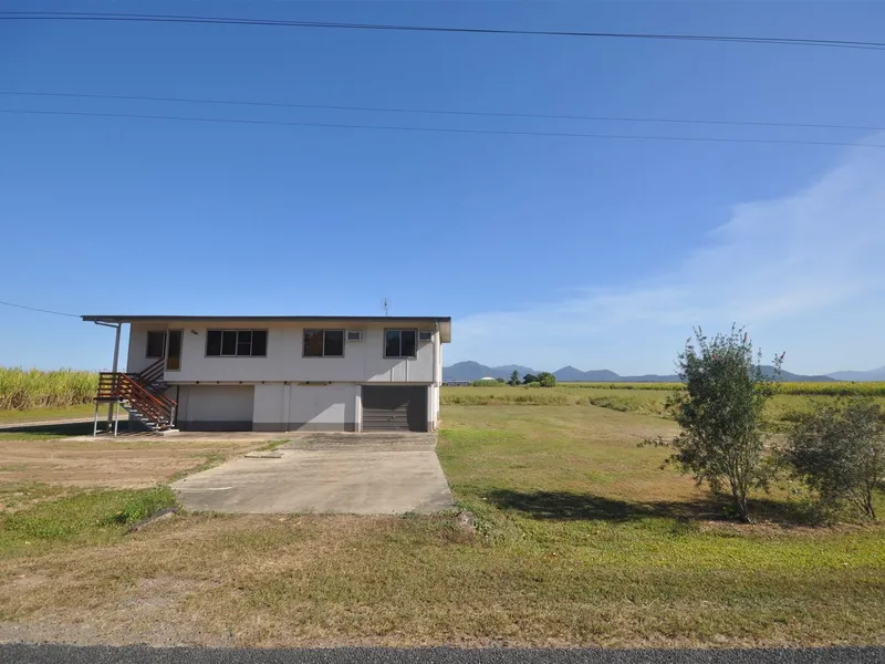 Acreage and Renovated Home Close to Town