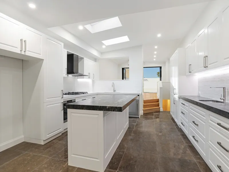 Superbly renovated tri-level luxury three bedroom home 