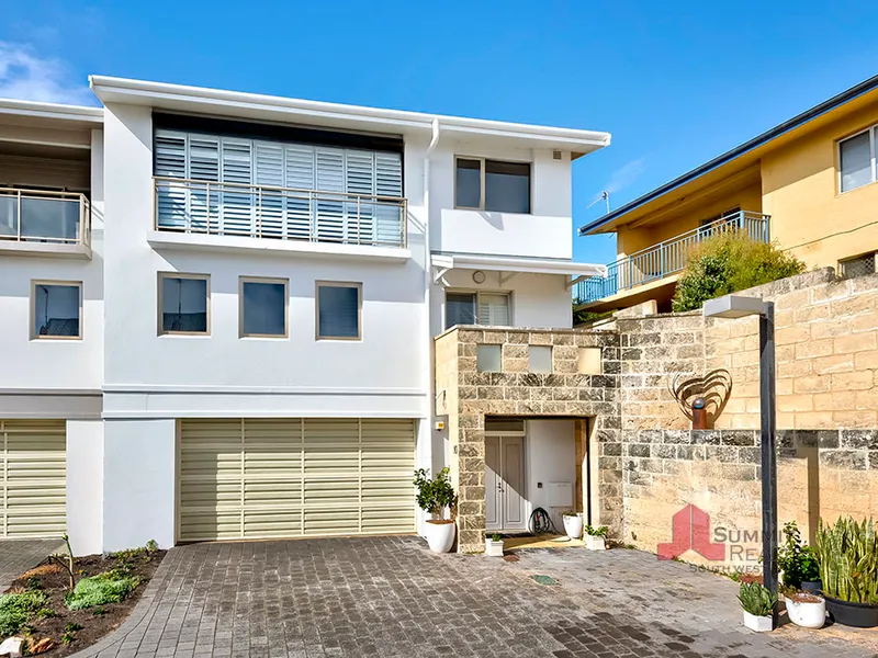 MODERN LIVING WITH BEACHSIDE CHARM IN A PRIME POSITION