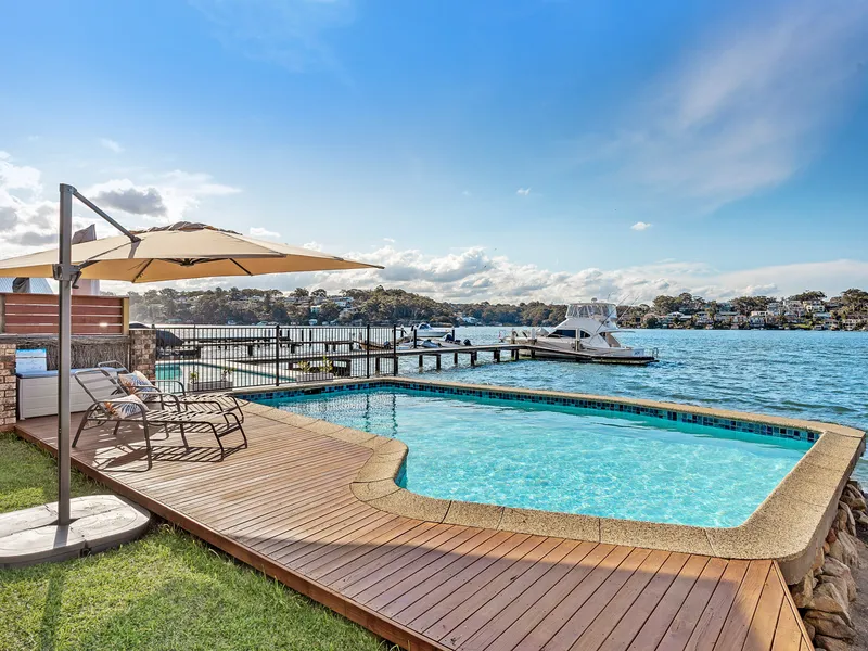 A stunning, north-facing waterfront oasis with panoramic views - need we say more?