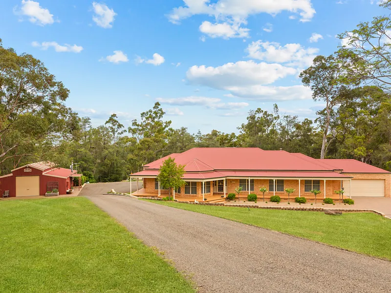 Tranquil oasis amid picturesque acreage surrounds