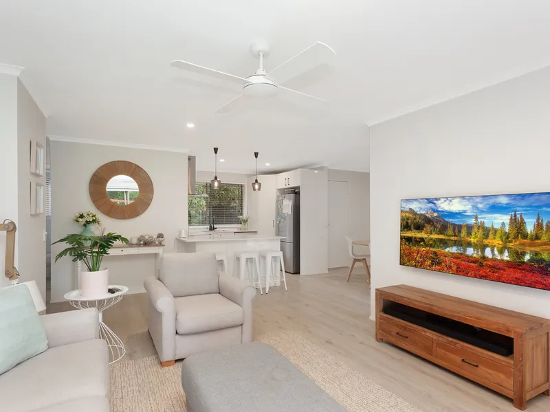 A REAL SURPRISE PACKAGE ... BEAUTIFULLY RENOVATED HOME WITH BIG PRIVATE YARD SPACES!