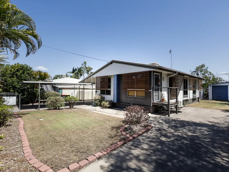 BEAUTIFULLY PRESENTED HOME WITH SPARKLING IN-GOUND SWIMMING POOL, TROPICAL GARDENS AND DOUBLE BAY SHED!