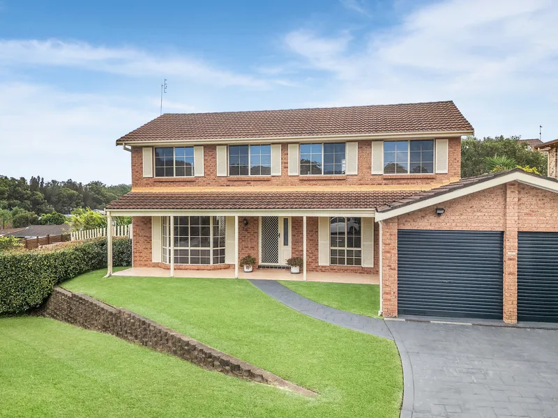 Modern five bedroom home with multiple living areas inside and out