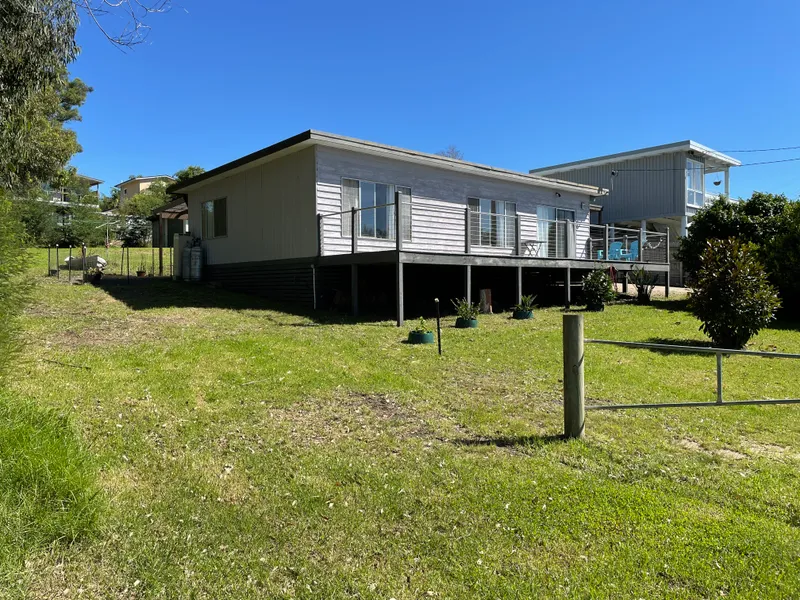 Unique waterfront views, short walk to town.