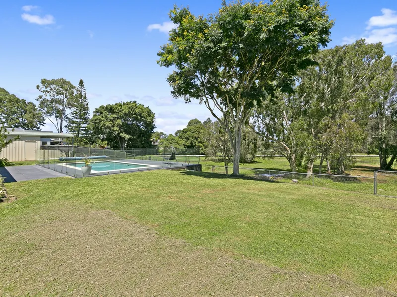 An Idyllic Single Level Paradise on One Acre