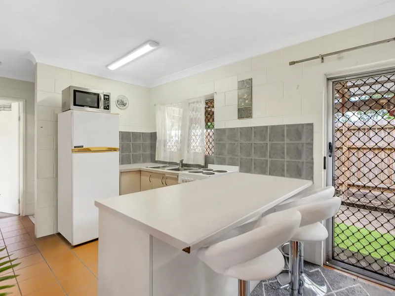 Invest or First Nest: Ground Floor, Two-bedroom Unit within Minutes to Cairns' CBD