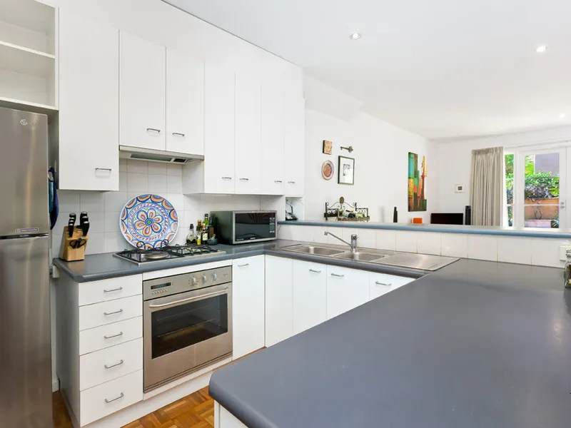 Designer Two Level Three Bedroom Townhouse!